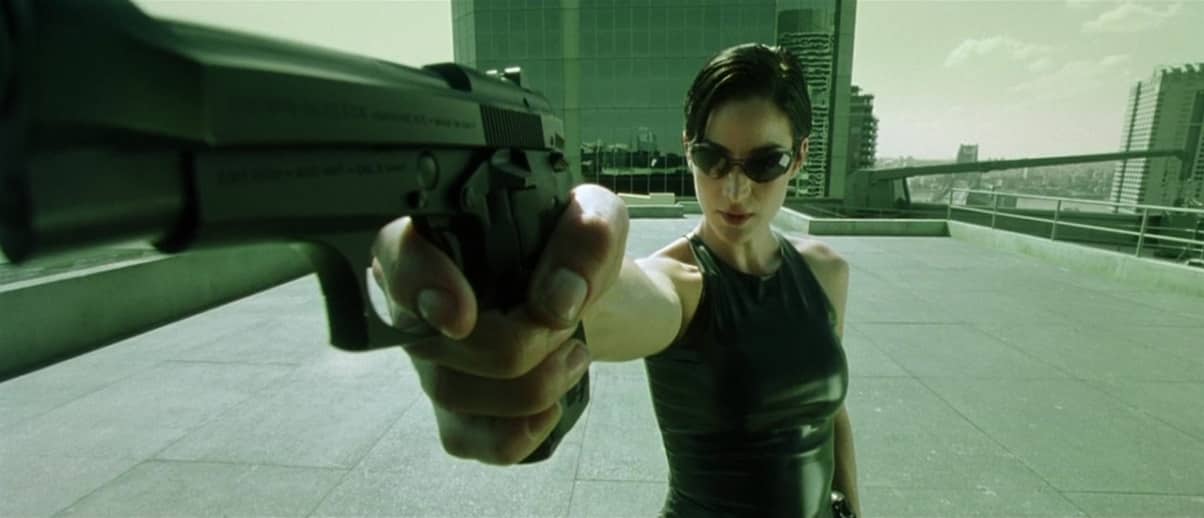 Le coreografie dei combattimenti in Matrix, 1999, Wachowski, Carrie-Anne Moss, Trinity, pistola
